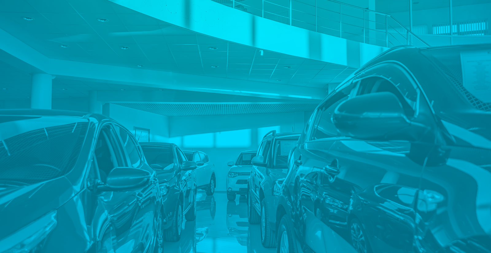 Image showing rows of cars in a showroom with blue lighting, highlighting sleek automotive design.